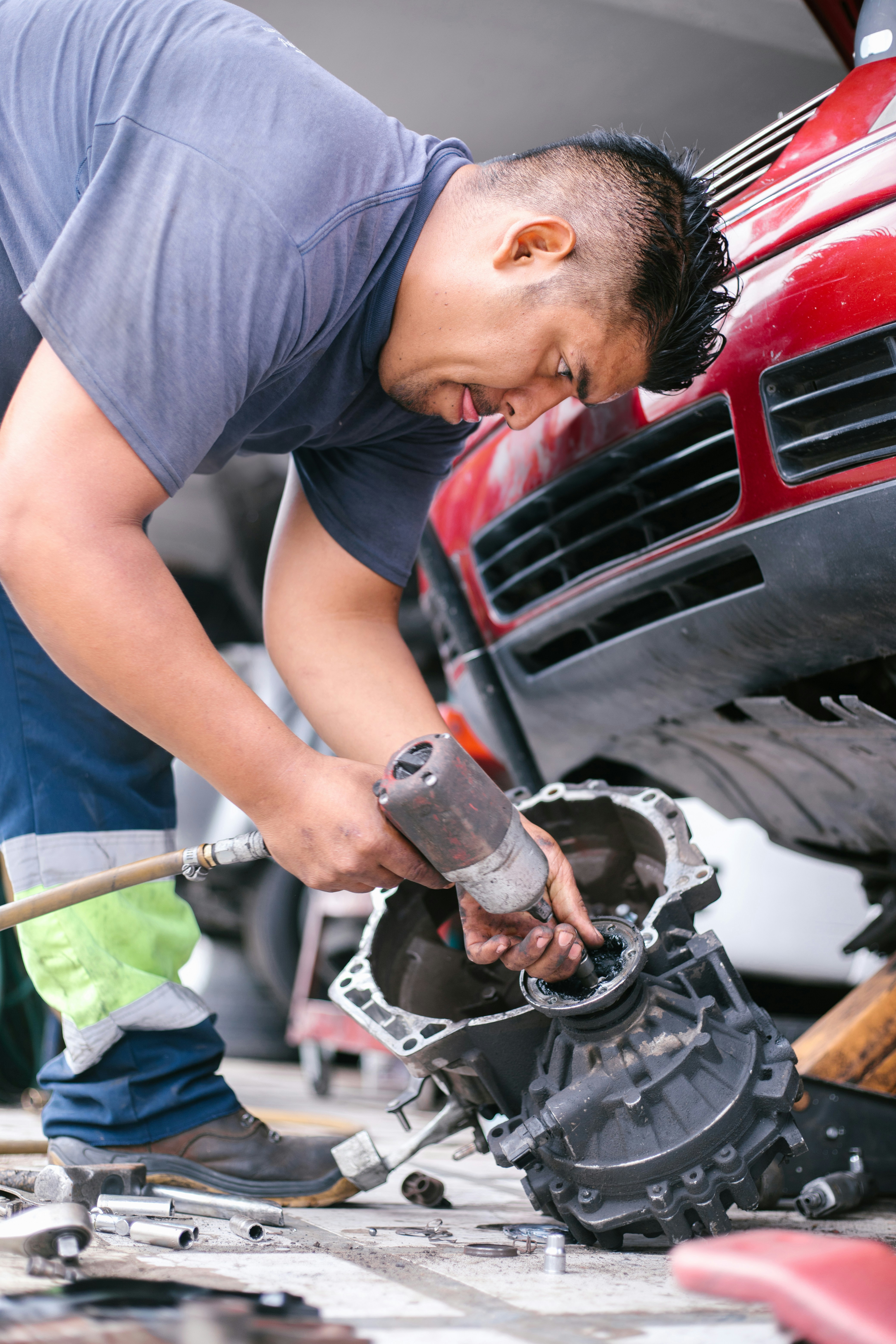 Mechanic inspecting a transmission
